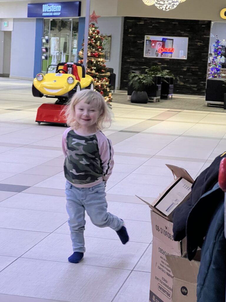 Our little helper at gift wrapping.